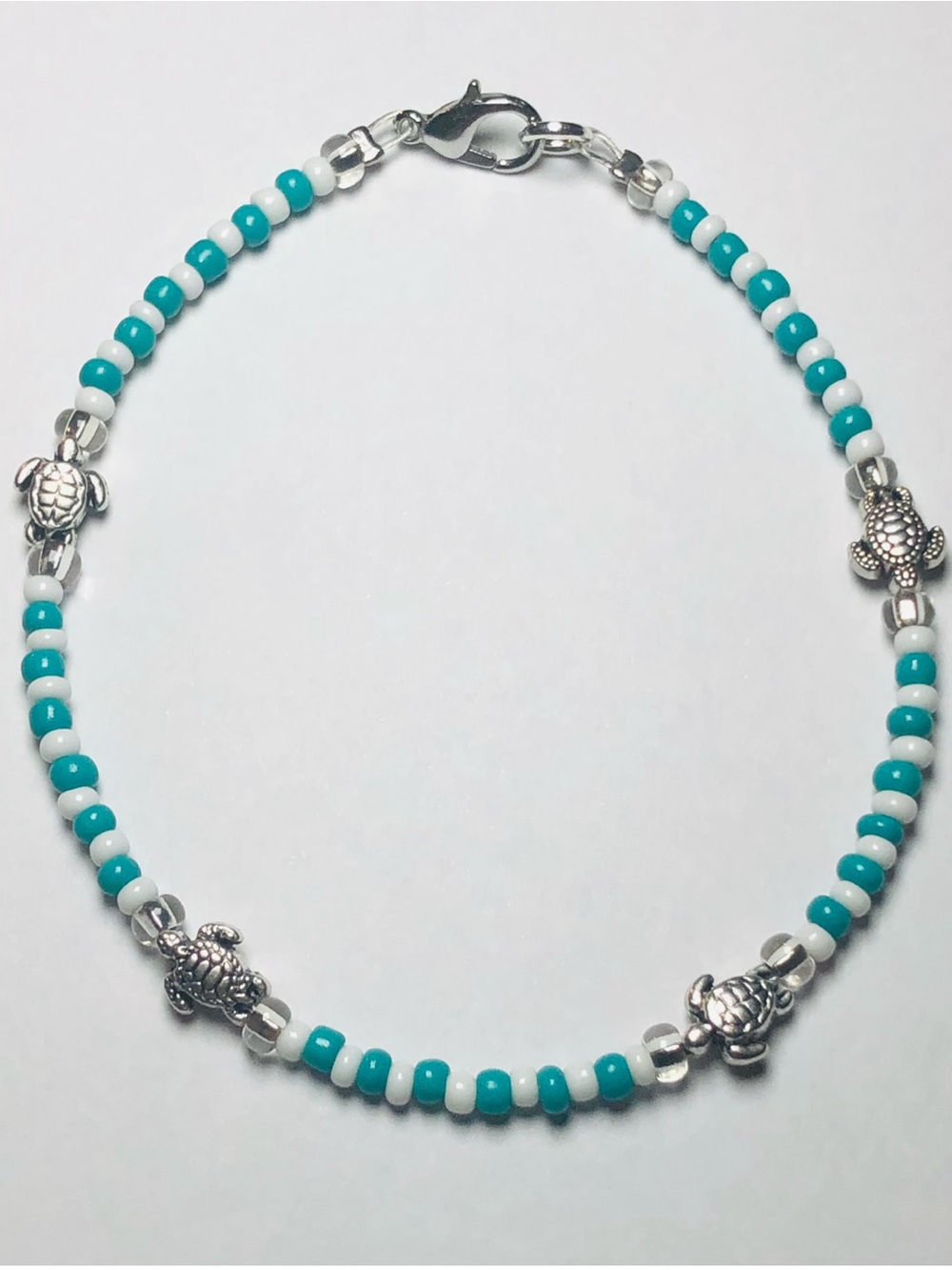 Turquoise and White Beaded Necklace with Silver Turtle Accents